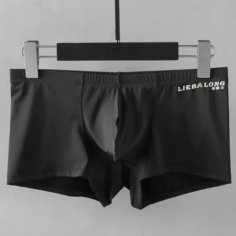 Seksowna bielizna męska bokserki lodowy jedwab Sexi dla chłopców mężczyzna U wypukła duża torba oddychające spodenki z wybrzuszeniem nylonowe letnie majtki typu Pounch