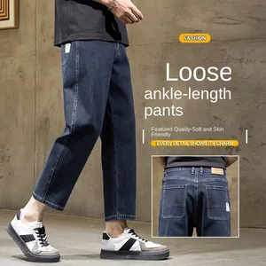 Miesten laukkuiset suoralahkeiset farkut Rento Stretch Denim 9-pituiset mukavat löysät housut kevätsyksyn monipuoliset leveälahkeiset housut